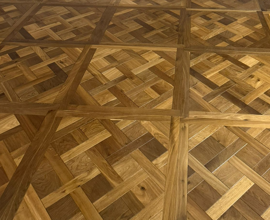 Smoked brushed wood Versailles parquet panel with diagonal cross herringbone pattern