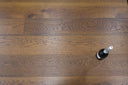 Lightly brushed hazelnut brown UV-oiled wood floor planks with visible grain