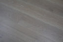 Light grey wood floor planks, lightly brushed UV-oiled finish with visible grain