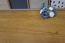 Golden wheat wood flooring, brushed matt finish, wide planks with natural grain