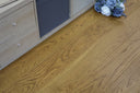 Golden wheat brushed matt wood flooring with long boards and distinctive wood grain