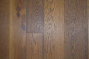 Hazelnut brown wood flooring with long planks, natural knots, and UV-oiled finish
