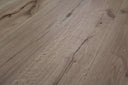 Brushed oiled engineered wood flooring plank detail in light tan with knots
