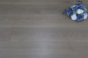 Light grey wood flooring boards with natural grain pattern and UV-oiled sheen