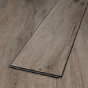 Wood-look WPC vinyl plank with beveled click edge, smoked antique white