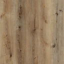 Close-up of light woodgrain LVT flooring with knots, small marks, and plank seams