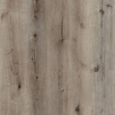 Light gray wood-look LVT planks close-up with knots and brushed grain texture