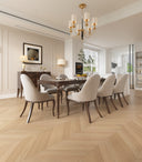 Engineered chevron wood flooring in light natural tone with herringbone pattern