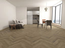 Light beige herringbone LVT floor planks in a dryback glue-down pattern