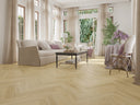 Light oak herringbone SPC click vinyl flooring planks in a living room