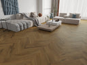 Walnut-toned herringbone SPC click flooring planks in a living room setting