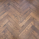 Whiskey oak engineered herringbone wood flooring in staggered diagonal plank layout