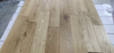 Natural oiled engineered wood flooring planks with visible grain pattern