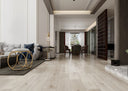 Laminate plank flooring with light grey woodgrain finish