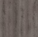 Midnight grey laminate plank flooring close-up with woodgrain texture.