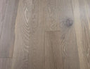 Engineered wood flooring in clouded white, brushed matt finish, visible knots and grain