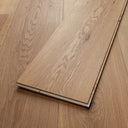 Engineered oiled wood flooring plank edge with click-style profile, light brown oak