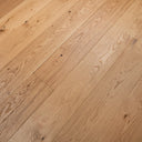 Light brown engineered wood flooring plank with visible grain and knots