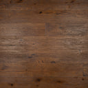 Engineered distressed antique brown wood flooring planks with visible grain and knots.