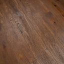 Distressed antique brown engineered wood floor with detailed grain and dark character marks.