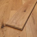 Rustic engineered wood flooring plank with warm brushed oiled finish and visible grain