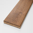 Solid hardwood flooring plank with visible grain and oiled finish, long edge view