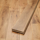Lacquered wood planks stacked with visible grain pattern and knots