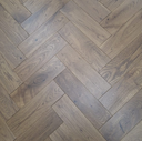 Smoked wood herringbone flooring with brushed oiled finish, 18mm boards