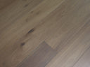 Engineered wood flooring with long boards, mixed grey and taupe tones, clear wood grain