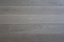 Engineered wood flooring planks, medium gray with natural wood grain texture