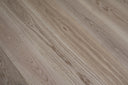 Natural engineered wood flooring plank texture with swirling woodgrain marks