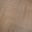 Light oak herringbone SPC flooring with built-in 1mm underlay, interlocking planks