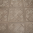 Glacier white SPC flooring panel with Versailles parquet herringbone pattern