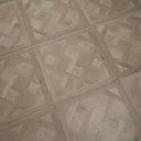 Glacier white SPC floor panel with Versailles parquet herringbone tiles and seams