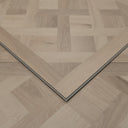 Glacier white SPC flooring panel with Versailles parquet pattern, beveled edges