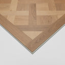 Natural SPC flooring panel with herringbone parquet pattern and V-groove edges