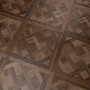 Caramel brown parquet wood floor panel showing detailed geometric parquet weave