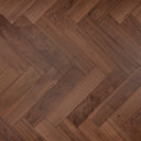 Walnut brown engineered wood flooring with herringbone plank pattern