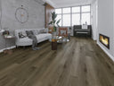 Wood-look SPC flooring with gray-brown planks and visible grain pattern