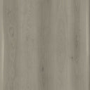 Close-up light gray oak woodgrain texture on SPC flooring surface
