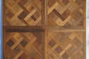 Smoked wood Versailles parquet panel, diamond and herringbone block arrangement