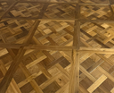Smoked brushed wood Versailles parquet panel with diagonal cross herringbone pattern