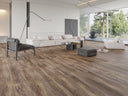 Wood-look SPC vinyl flooring, dark gray-brown wide plank boards in room