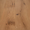 Engineered oak flooring planks with varied grain, knots, and visible plank seams