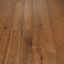 Engineered oak flooring planks close-up, medium warm brown with pronounced grain lines