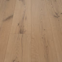 Light oak engineered wood flooring with visible plank edges and rustic knots
