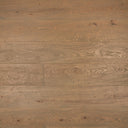 Distressed engineered wood plank flooring with visible grain pattern and seams