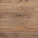 Engineered wood flooring in smoked white with distressed plank seams and knots