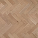 Light tan herringbone engineered wood flooring, unfinished with visible knots and grain