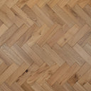 Natural engineered herringbone wood flooring with light tan brushed finish